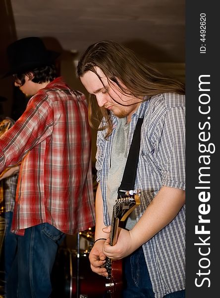 Two musicians on rehearsal.  Concert of group StockDog in club the Woman-ljuba. Rostov-on-Don. Russia