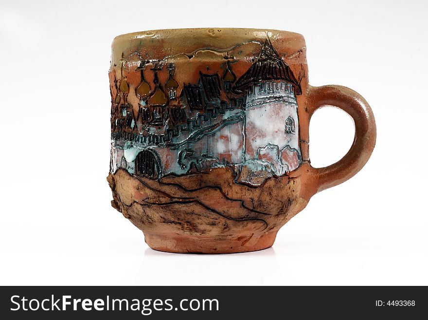 Beer mug, made from clay, with painting of depicting wall of ancient monastery. can be utillized designers in creation of different images. brown color.
