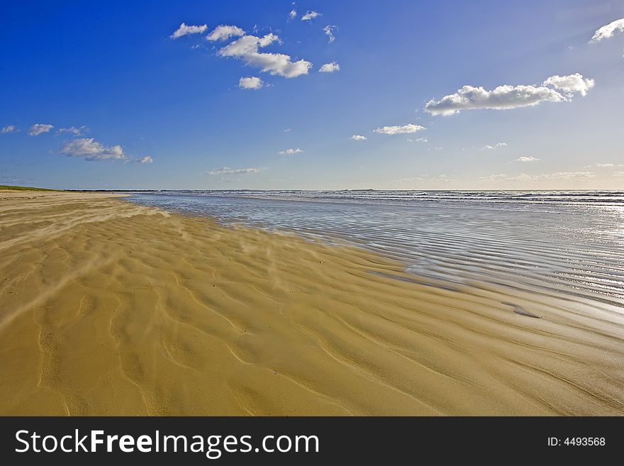 Sand rippled on the beach_France landscape. Sand rippled on the beach_France landscape