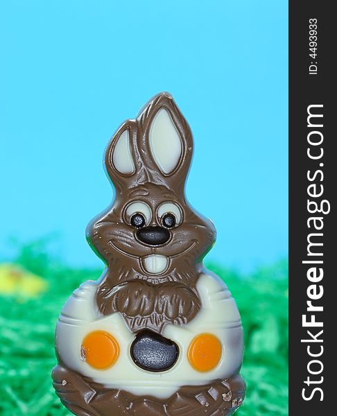 Chocolate easter bunny on blue