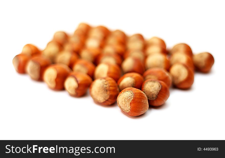 Hazelnuts on a white background