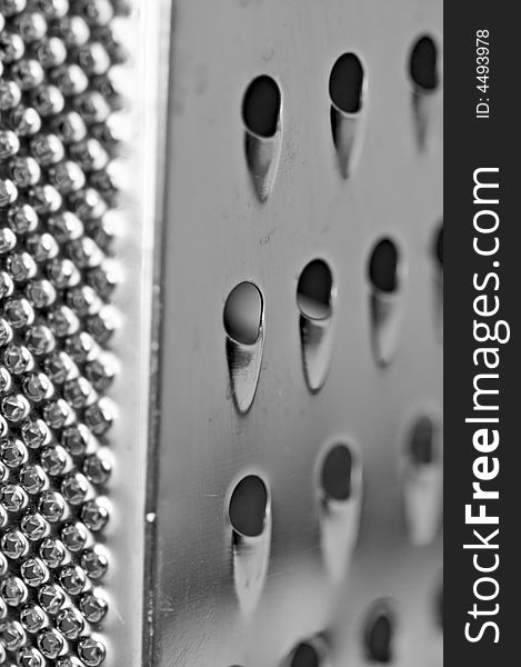 Macro view of stainless steel food grater. Macro view of stainless steel food grater