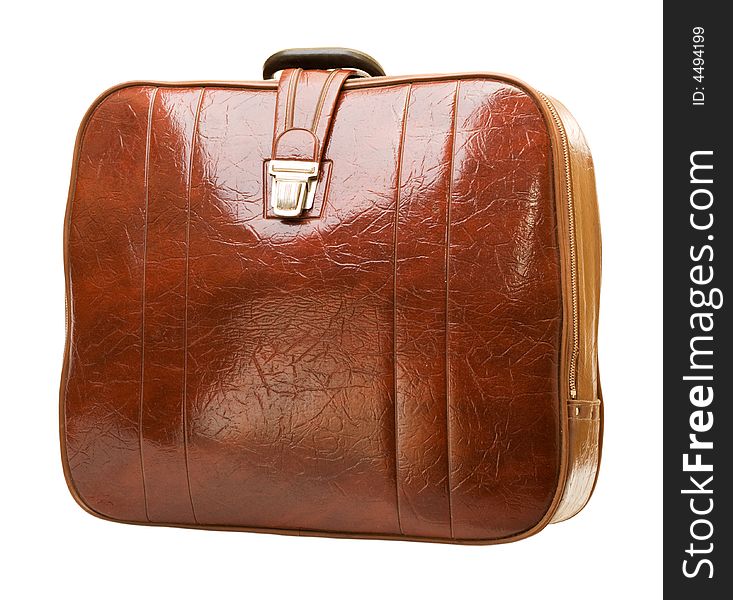 Brown leather suitcase. Isolated, close-up.