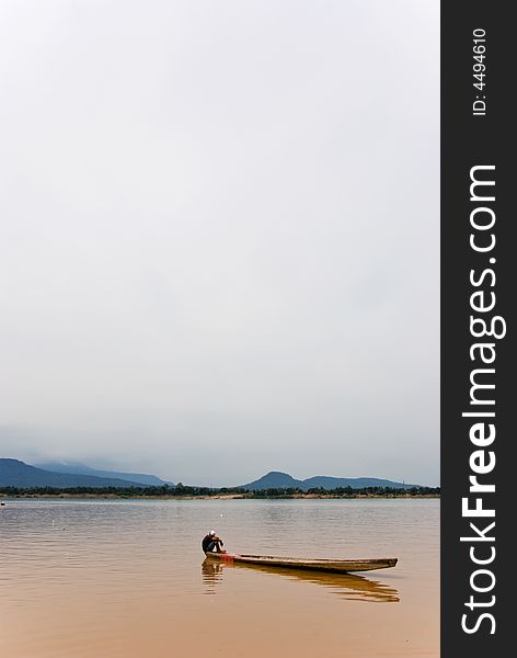 Mekong river boatmen on a canoe