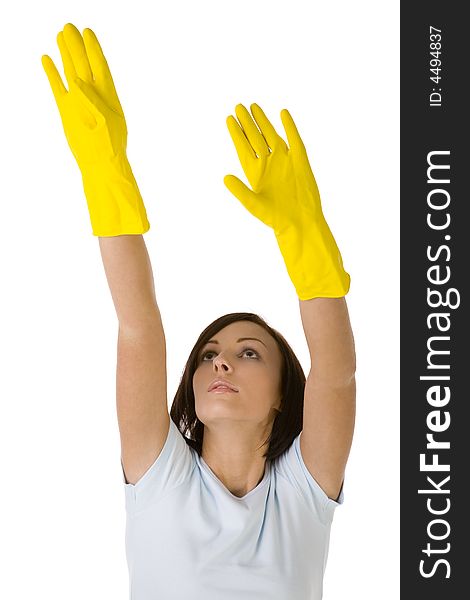 Young woman in yellow rubber gloves with raised up hands. She's reach to something. Front view, white background. Young woman in yellow rubber gloves with raised up hands. She's reach to something. Front view, white background.