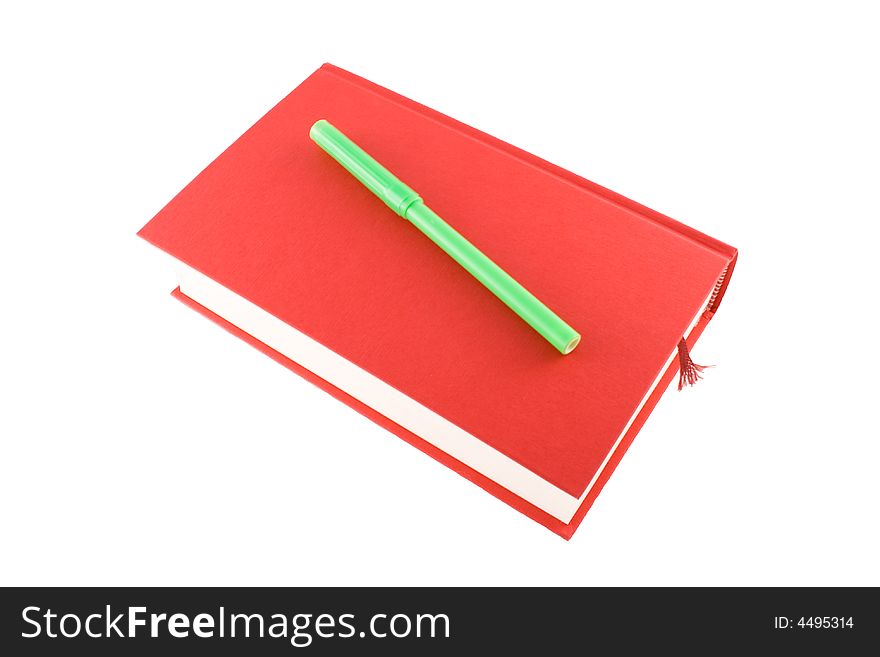 Red book and marker on a white background