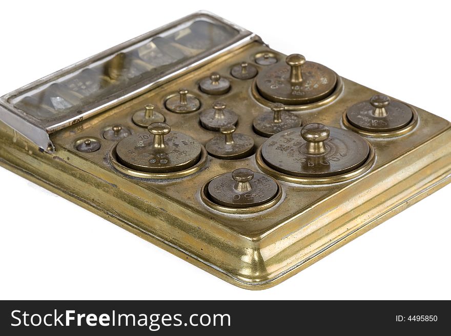 Box with an assortment of different weights brass. Box with an assortment of different weights brass