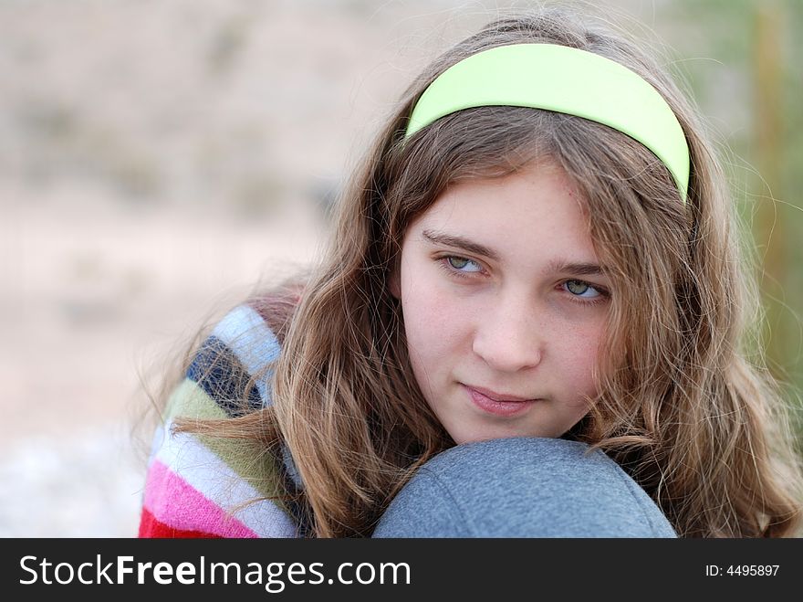 Young and happy girl is enjoying herself outdoors. Young and happy girl is enjoying herself outdoors