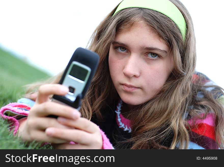 Young girl and cellphone