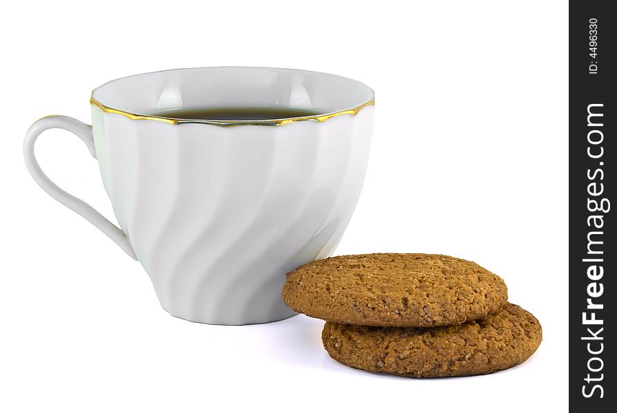 Cup and oatmeal cookies overt white. Cup and oatmeal cookies overt white