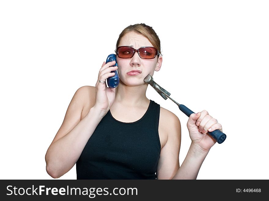 Woman holding a hammer not knowing what to do. Woman holding a hammer not knowing what to do