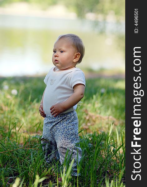 Child walking on a meadow