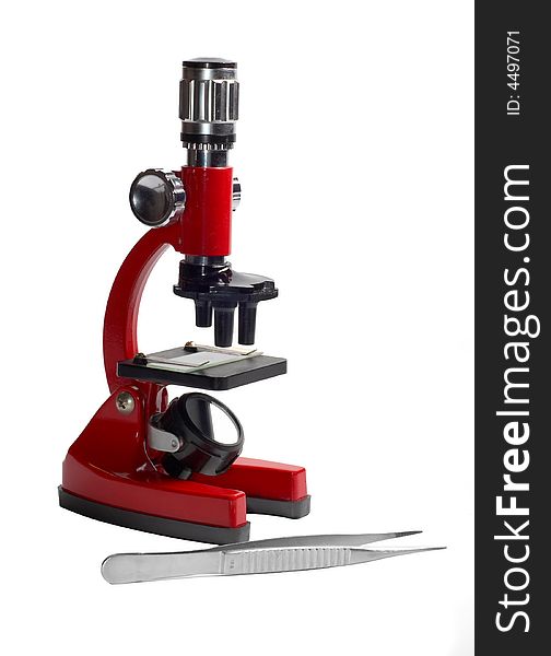 Red microscope and tweezers isolated on white background