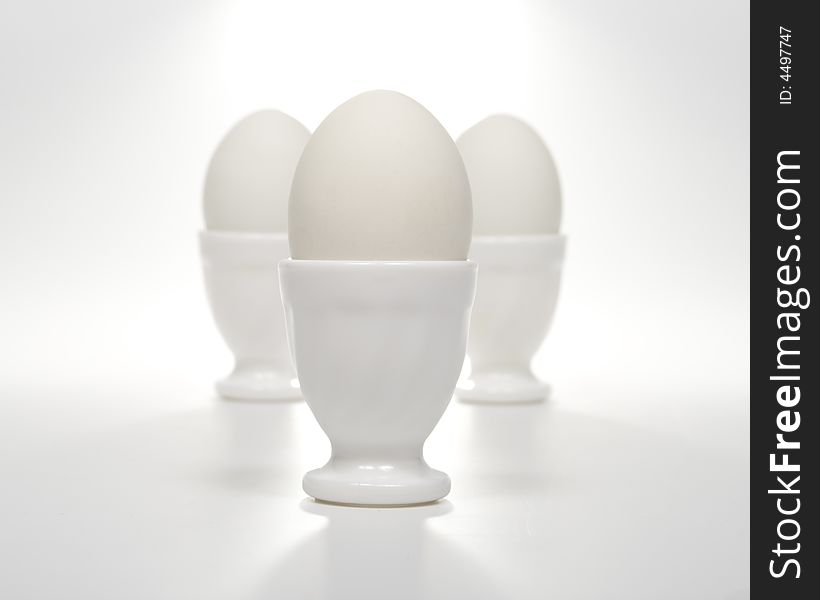 Three White Eggs In Eggcups