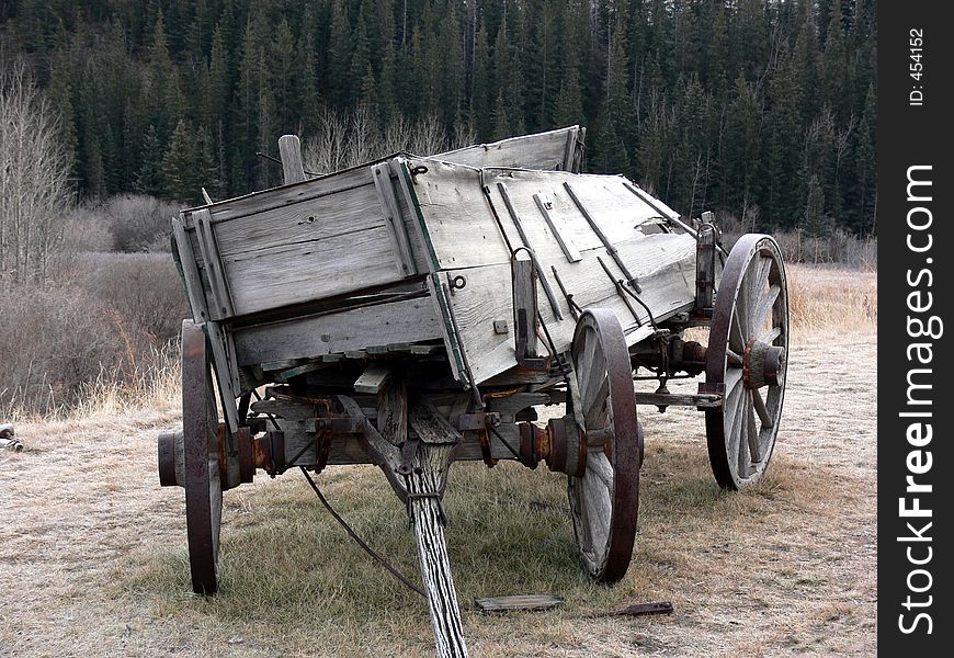 This old wagon has seen better days however is still intact where it sits in the foothills of Alberta. This old wagon has seen better days however is still intact where it sits in the foothills of Alberta.