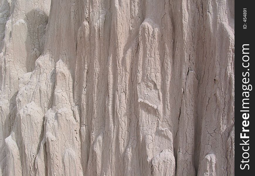 A closeup view of a formation in Cathedral Gorge State Park shows clay sediment eroded by water over time. A closeup view of a formation in Cathedral Gorge State Park shows clay sediment eroded by water over time.