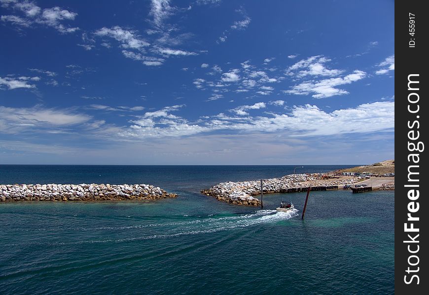 Boat arriving into the coast. Boat arriving into the coast