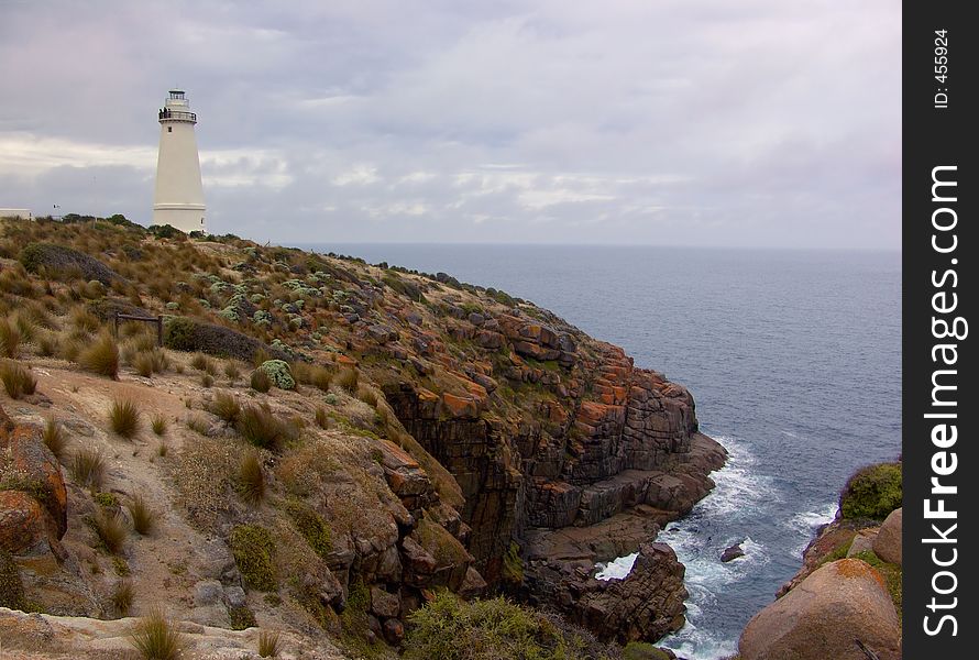 Lighthouse on rugged coast