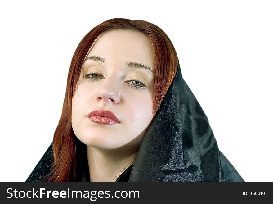 Young female wearing a black hood (clipping path). Young female wearing a black hood (clipping path)