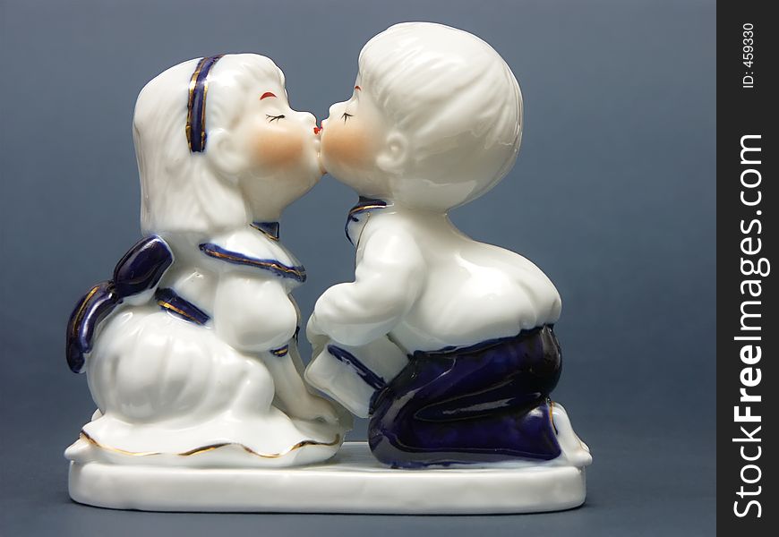 China figurine of boy and girl kissing each other. China figurine of boy and girl kissing each other