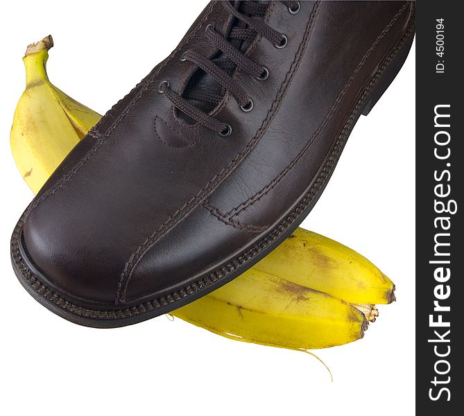 Isolated Shoe On Banana Peel