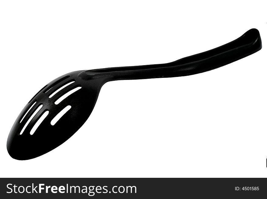 A black spoon you can find in most kitchens.