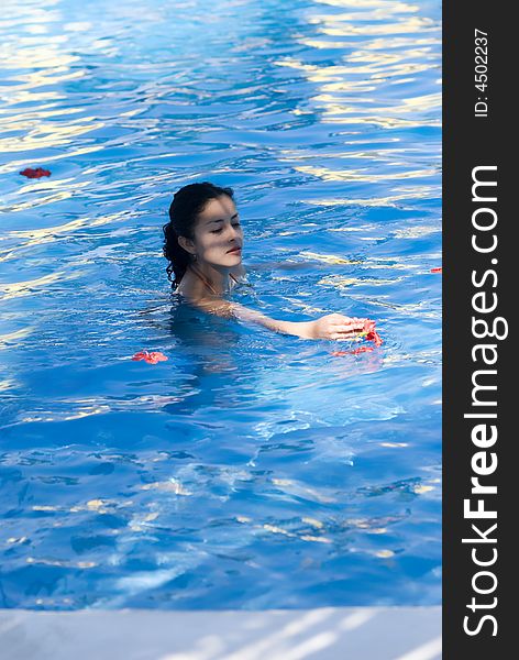 Young girl in swiming pool