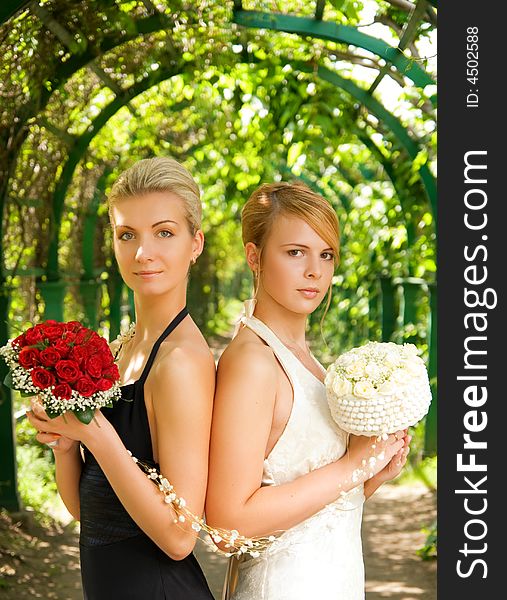 Two girls with a flowers