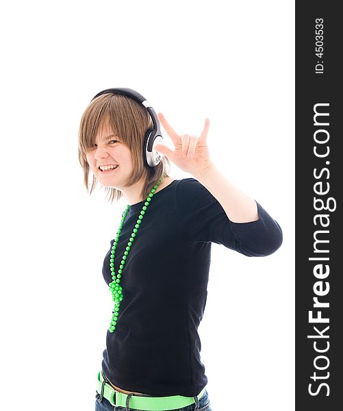 The young girl with a headphones isolated on a white background