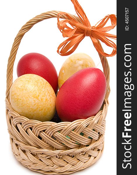 Easter basket with colored eggs. Easter basket with colored eggs.