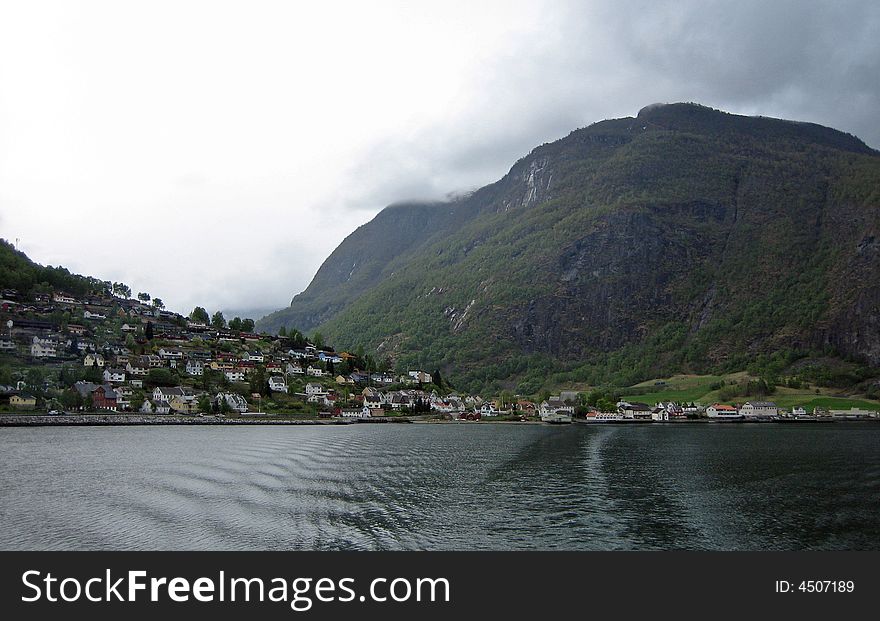 View Of Small Village On Norwegian Fjord