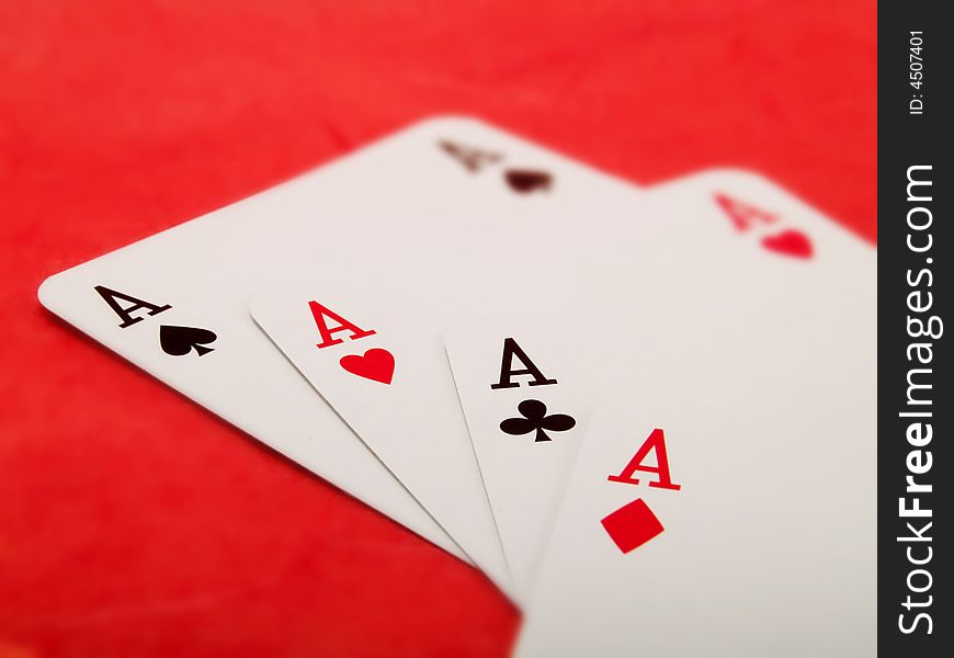 Playing cards on a red background. Playing cards on a red background