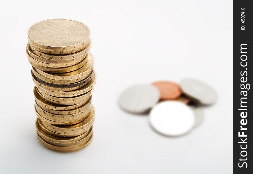 Pile of coins on a white background. Pile of coins on a white background