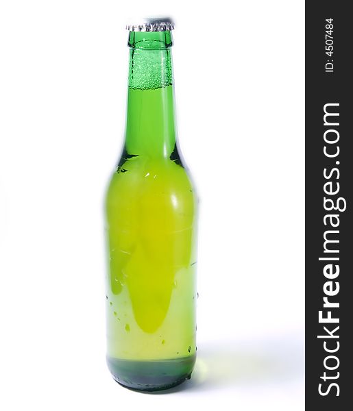 Green beer bottle on a white background