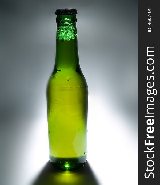 Close-up of a green beer bottle