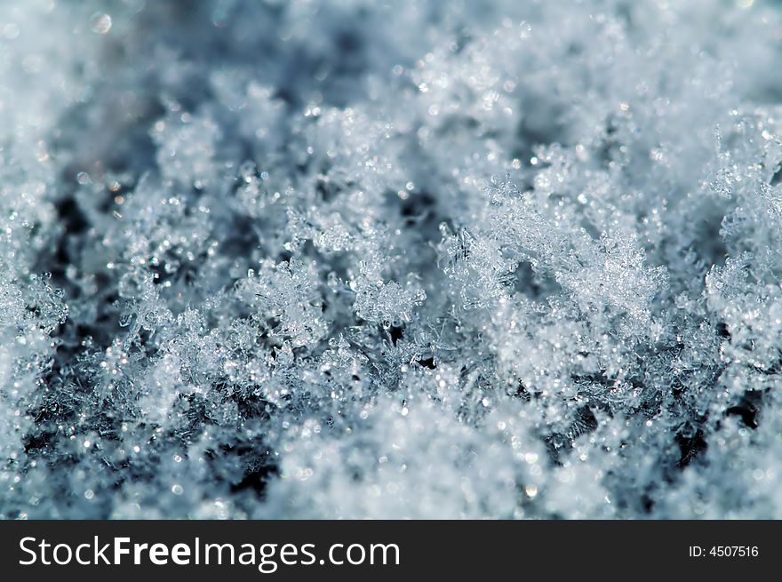 Blue snowflake macro, winter background. Blue snowflake macro, winter background