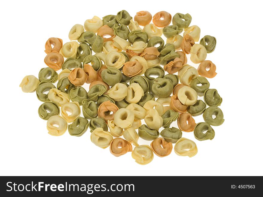 Tortellini tricolore pasta isolated on a white background. Tortellini tricolore pasta isolated on a white background