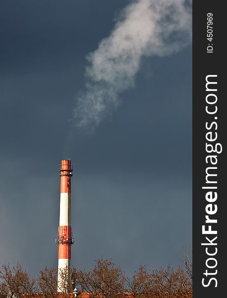 Thick smoke coming out of factory chimney