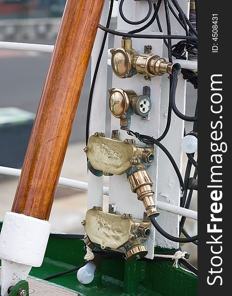 Old and grunge electric sockets aboard a vintage ship