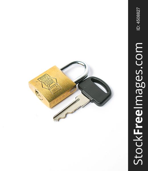 Isolated lock silver and golden white black key. Isolated lock silver and golden white black key