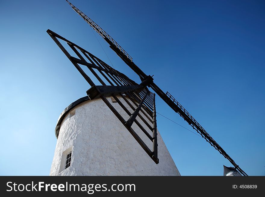 Spanish windmill in Castilla with a blue sky
