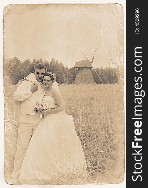 Bride and groom retro looking portrait. Bride and groom retro looking portrait