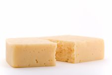 Cheese With A Rough Crack Stock Images