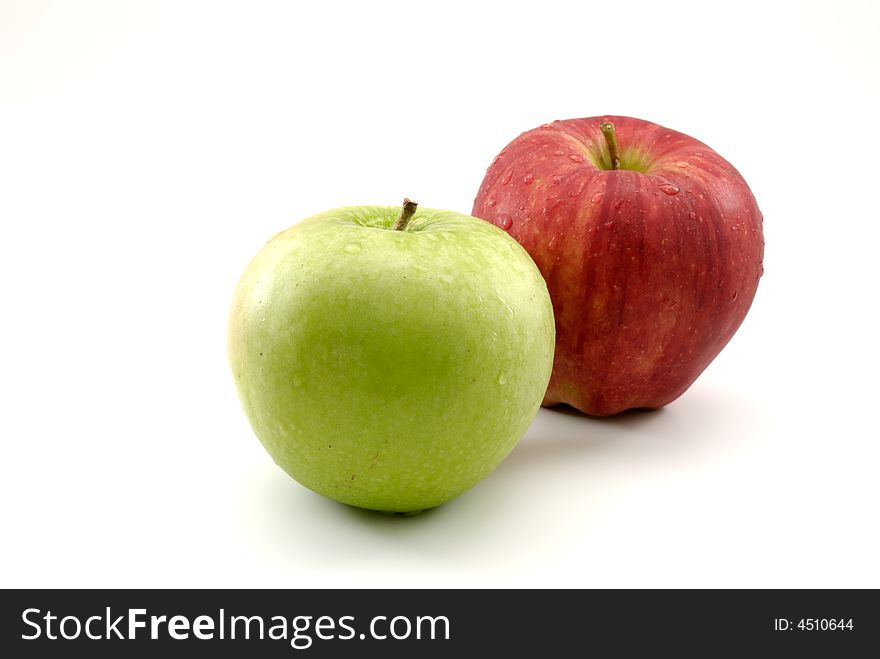 Pair of apples isolated on white background, granny smith apple in front