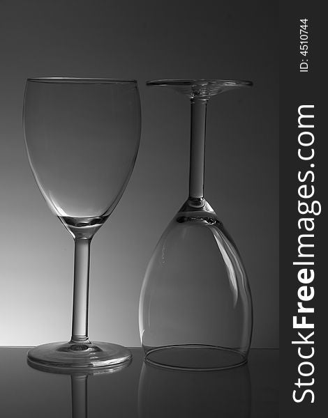 Monochrome Picture Of 2 Wine Glasses Upsidedown