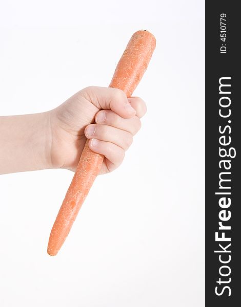 A carrot orange in hand