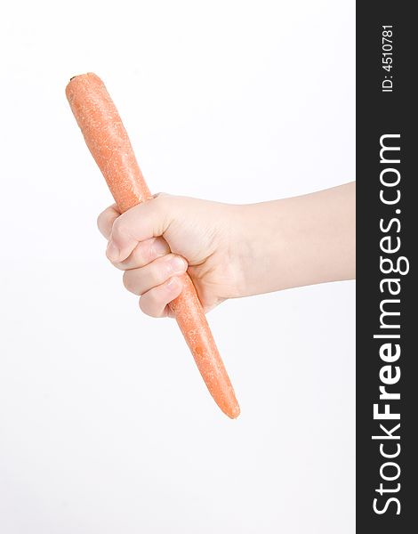 A carrot in hand right