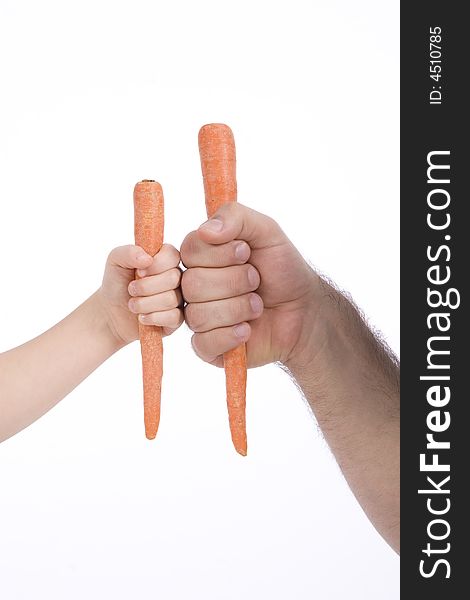 Two carrots in their hands