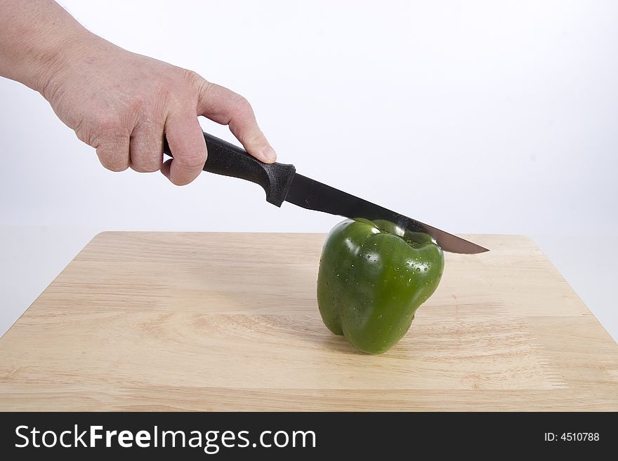 A Peppers with a knife