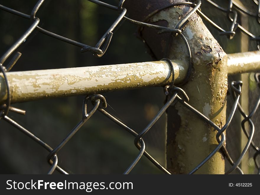 Close-up of a rusty fence post